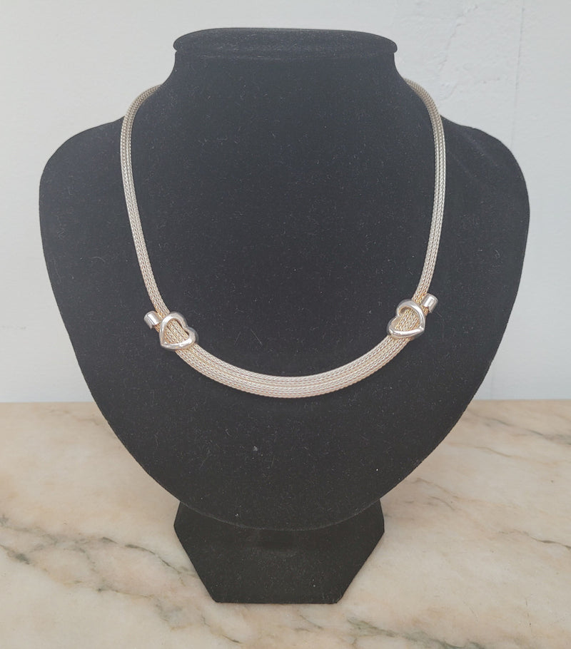 Beautiful Italian sterling silver woven double heart necklace. In good condition.