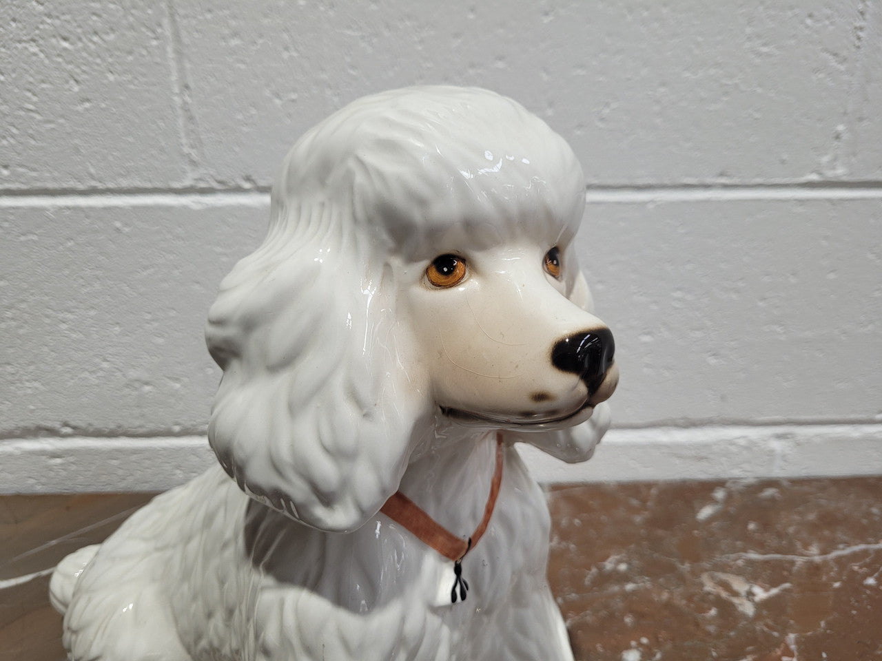 Vintage Italian ceramic Poodle figurine. It is beautifully detailed and in good original condition with no chips or cracks does have crazing to glaze.