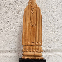 Vintage Olivewood statue of praying Virgin Mary on dark wooden plinth. Condition comensurate with age, please view photos as they help form part of the description.