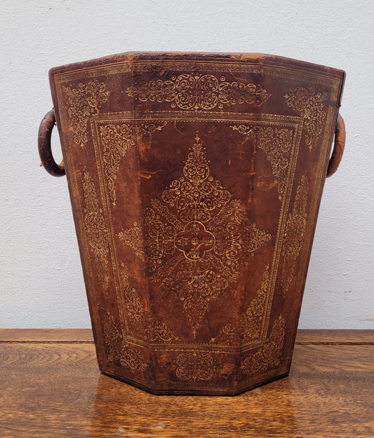 Vintage Italian tooled leather waste bin. It has been sourced locally and is in good original detailed condition. Please view photos as they help form part of the description.