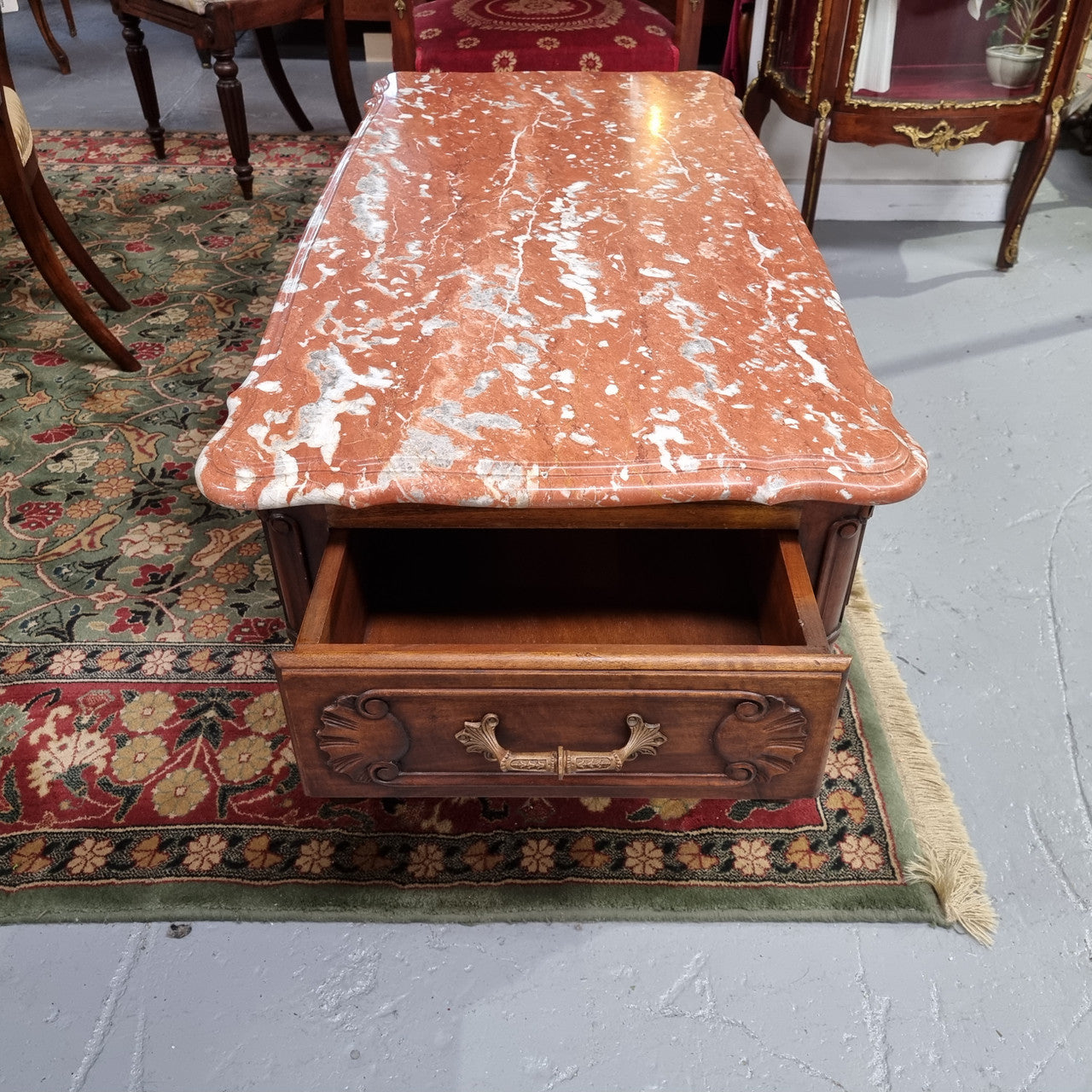 Amazing original walnut Louis XV style coffee table with a marble top, one drawer on either end and a faux drawer at the front. In good original detailed condition, sourced in France.