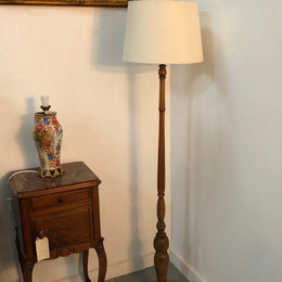 Tudor style Oak standard lamp, rewired and with foot switch. In good original condition.