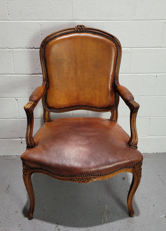 French Walnut Louis XV style desk chair with faux leather upholstery. The upholstery is in good original condition and very comfortable to sit in.