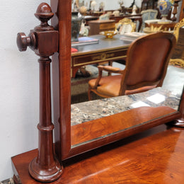 Antique Mahogany dressing table mirror. The mirror is still in good condition and tilts back and forward. It is in overall good original condition. Please view photos as they help form part of the description.