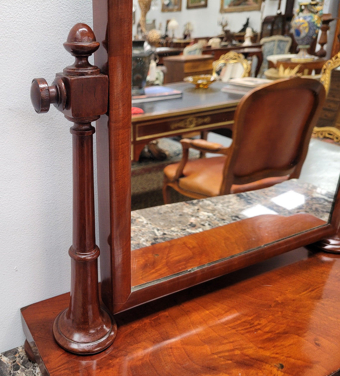 Antique Mahogany dressing table mirror. The mirror is still in good condition and tilts back and forward. It is in overall good original condition. Please view photos as they help form part of the description.