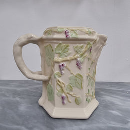 Belleek brown stamp (1980 – 1993) jug with ivy decoration, branch handle and Bacchus spout. It is in good original condition, please view photos as they help form part of the description.