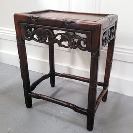 Chinese Rose wood occasional table. Nicely carved and could be used as a coffee table or and occasional table. It is in good original condition.