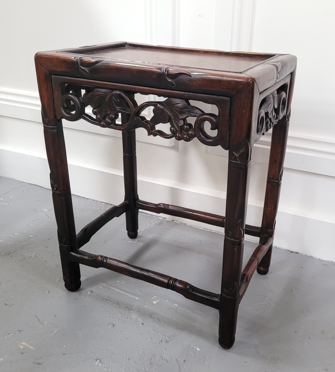 Chinese Rose wood occasional table. Nicely carved and could be used as a coffee table or and occasional table. It is in good original condition.