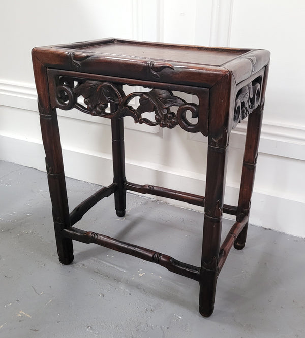 Chinese Rose wood occasional table. Nicely carved and could be used as a coffee table or and occasional table. It is in good original condition.