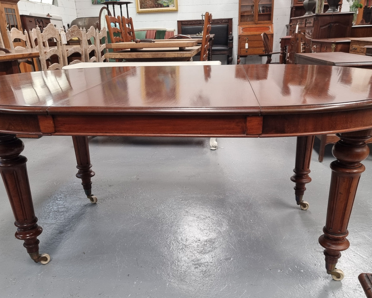 Amazing Victorian round Mahogany extension table. It comes with one extension leaf which can be added to the center of table when required. Sourced Locally and in good original detailed condition.