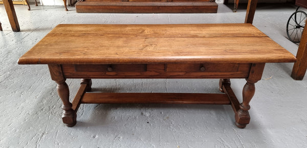 Fabulous Rustic French Oak coffee table with two drawers. It is in good original detailed condition.