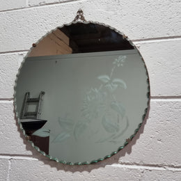 Vintage Art Deco round wall mirror with pie crust edge and etched floral design . In good condition, please see photos .