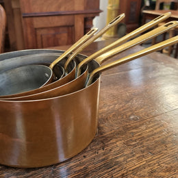 Set of Five French Vintage Copper & Brass Saucepans. They are in good original condition.