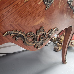 Stunning Louis XV style marquetry inlay marble top two drawer commode. It has decorative ormolu mounts and beautiful marble top. In good original detailed condition.
