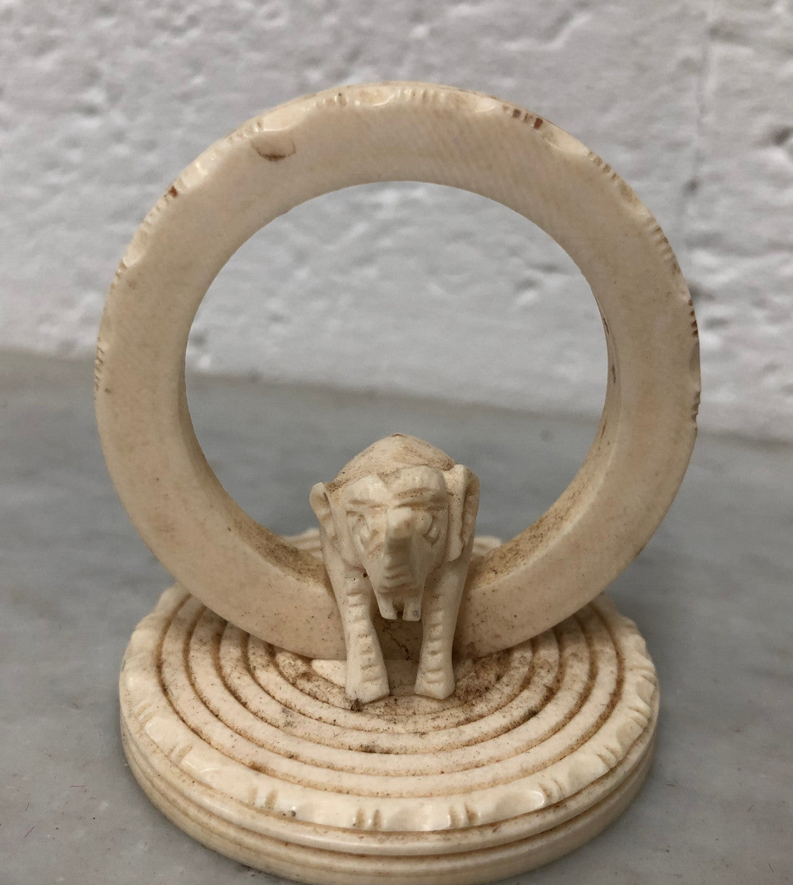 Unusual Antique carved Ivory serviette ring Featuring an Elephant. In good original condition.