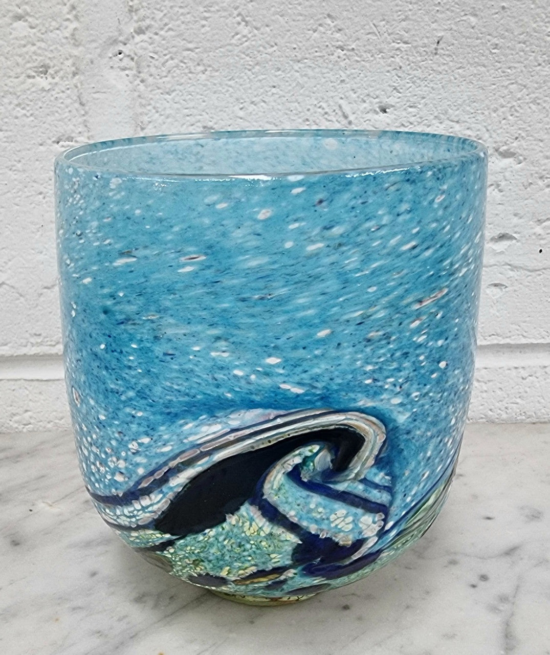 Colorful art glass vase signed by Peter Reynolds. In good original condition with no chips or cracks.