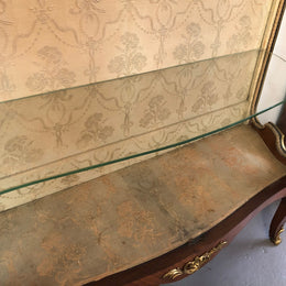 19th Century ornate French Walnut marquetry inlay display cabinet. Has beautiful ornate ormolu mounts and its original glass. In good original detailed condition.