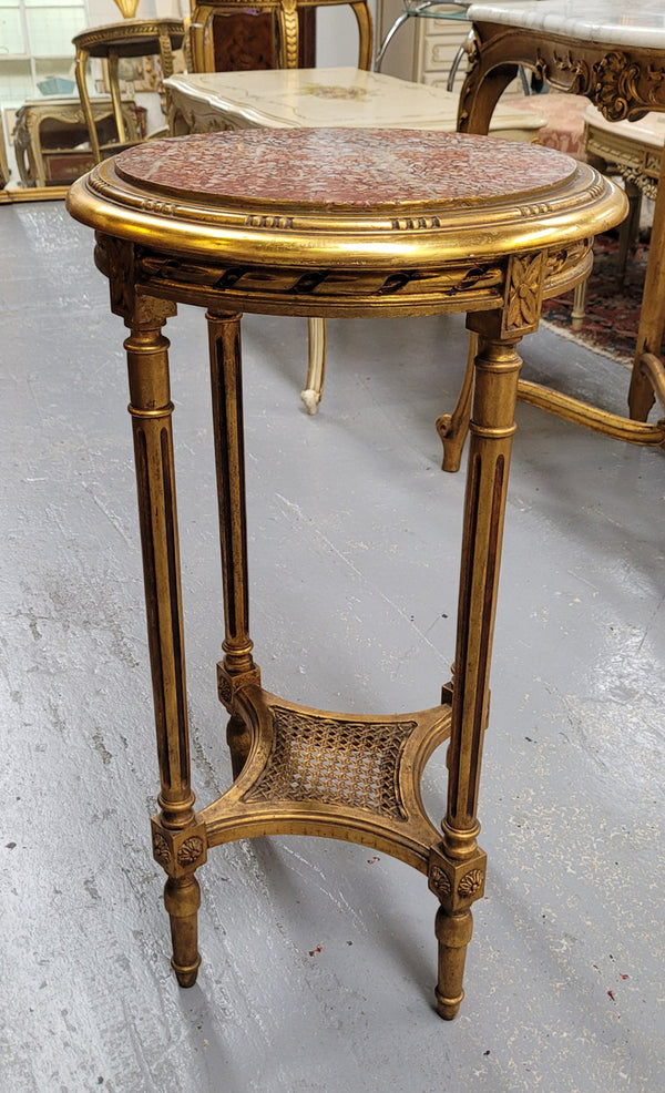 Late 19th Century French Louis XVI style round marble top side table/ lamp table. It is in good original detailed condition and has been sourced from France.