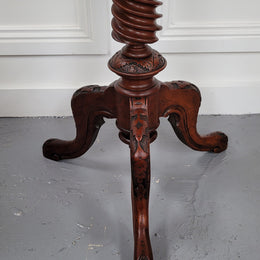 Rare early Victorian Irish Burr Walnut wine table. It has a beautiful carvings and a stunning burr walnut top, on a barley twist column and three shaped legs. It has been sourced locally and is in good original detailed condition. We also have a second table being sold separately which when together make a matched pair.
