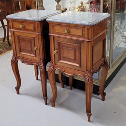 Pair of Walnut Louis XV style grey marble top bedside cabinets. Single drawer, one cupboard and lovely French cabriole legs. They have been sourced from France and are in good original condition.