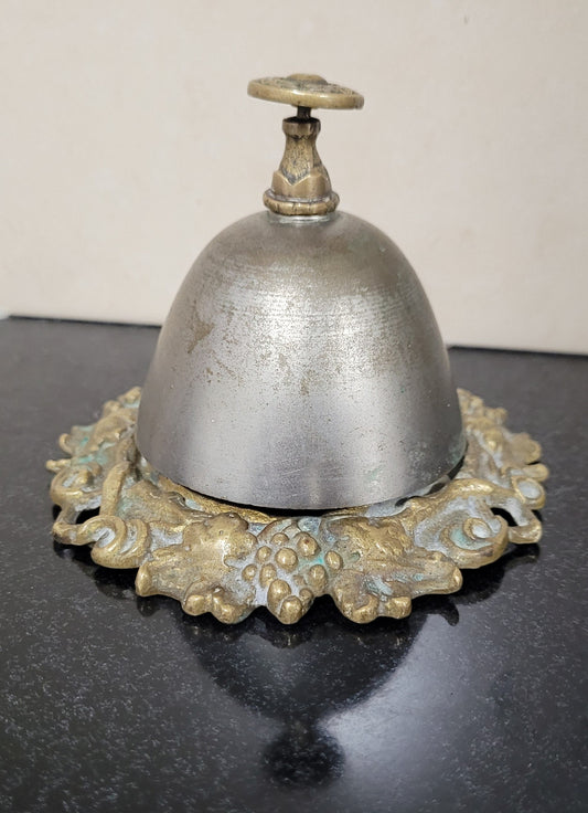 Vintage brass and white metal stone counter bell with a great ring, Circa 1920's. It is in great original condition. Please see photos as it forms part of the description.