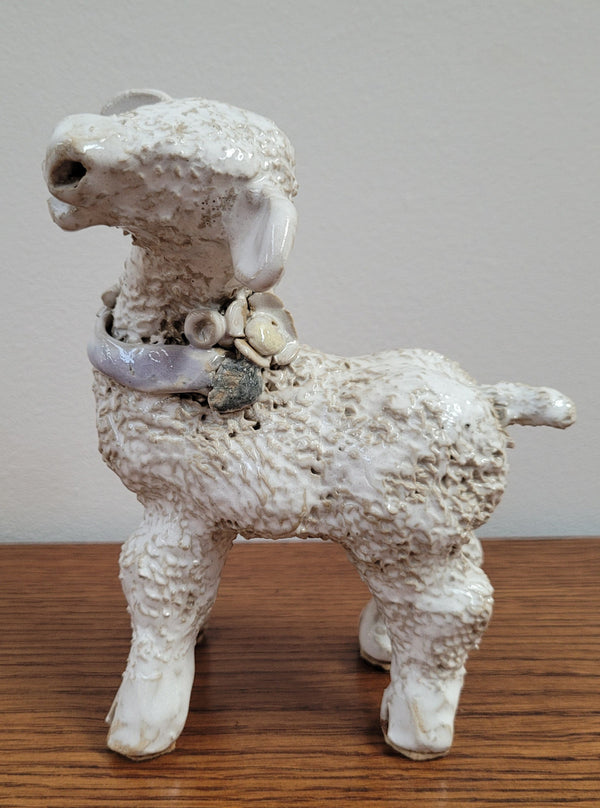 Hand Made Glazed Terra Cotta Sheep signed “Giel”. In good condition.