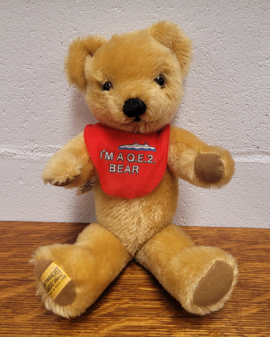 “Merry Thought” Golden Mohair fully Jointed Teddy Bear.  Made in England, commemorating QE2. 32cm length. Excellent Condition.