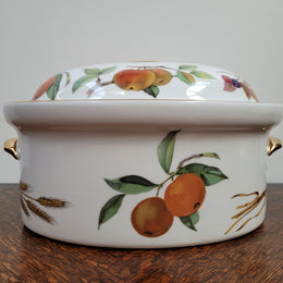 Royal Worcester porcelain gold trim & Knob “Evesham” pattern oven to tableware covered casserole. Made in England. In good condition with no chips or cracks.