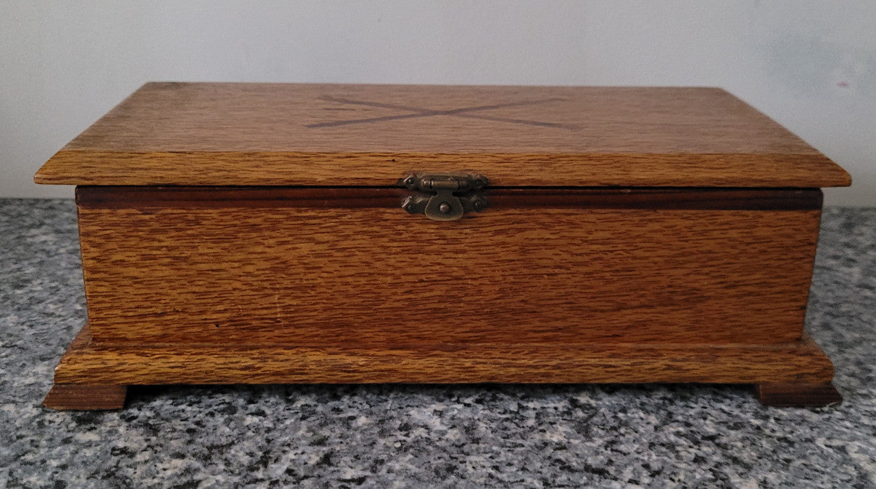 Vintage Silky Oak and Cedar jewellery box with red velvet lining. It is in good original condition, please view photos as they help form part of the description.