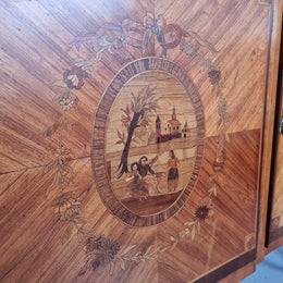 A high quality 19th Century French marquetry inlaid Kingwood marble top credenza. It has an attractive solid marble top and decorative marquetry inlay throughout. It has plenty of storage space with three drawers and three doors. It has been sourced from France and is in good original detailed condition.