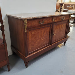Louis 16th style Mahogany marble top cupboard and two drawers with decorative marquetry inlay and gilt bronze mounts. In good original detailed condition.