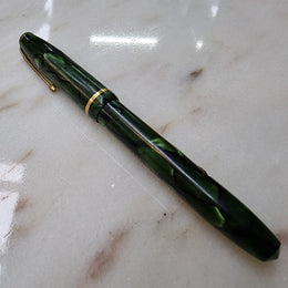 Conway Stewart  "Dinkie" 550 fountain pen green and black marble with 14k gold Nib .