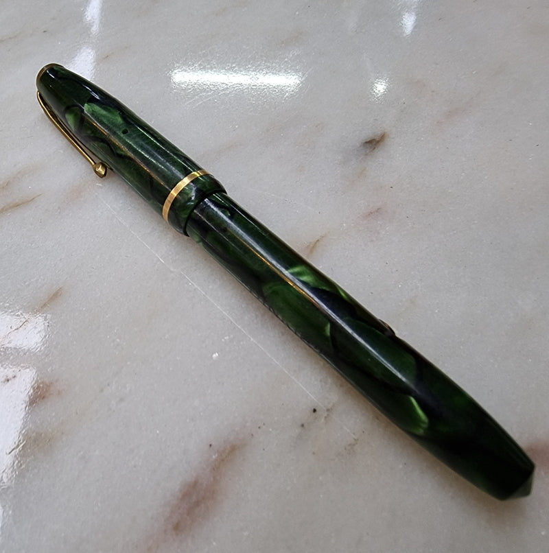 Conway Stewart  "Dinkie" 550 fountain pen green and black marble with 14k gold Nib .