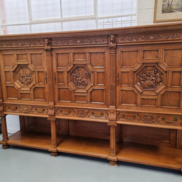 Impressive and grand French Oak Renaissance style sideboard. Beautifully detailed carvings and plenty of storage with three very large cupboards with a total of eight adjustable shelves along with three large drawers. It has been sourced from France and is in very good original detailed condition.