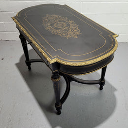 19th Century Napoleon III boulle ebonized centre table. Beautiful decorative mounts and has a drawer on one side. In good restored condition.
