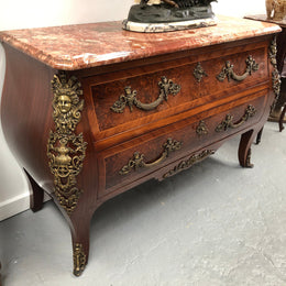 Grande French Louis XIV style Amboyna and walnut two drawer marble top commode, with amazing detailed ormolu mounts, and sienna colour marble top. In good original detailed condition.