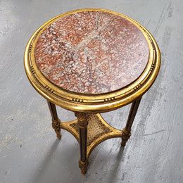 Late 19th Century French Louis XVI style round marble top side table/ lamp table. It is in good original detailed condition and has been sourced from France.