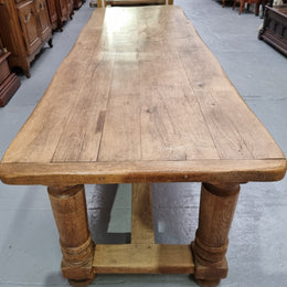 French Oak stretcher base farmhouse table with solid turned legs. It is in good original condition.