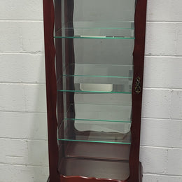 Vintage Mahogany petite display cabinet with three solid glass shelves. Ideal for a small area and is in good original detailed condition.