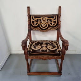 Beautifully carved Walnut Egyptian Revival armchair with amazing hand sewn Stumpwork embroidery coverings. In good original detailed condition.