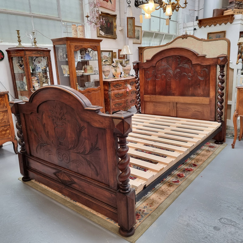 French 19th Century Walnut Henry II style queen sized bed with Barley Twist posts. Bed comes complete with custom made slats. Just place your mattress on top. In good original detailed condition.