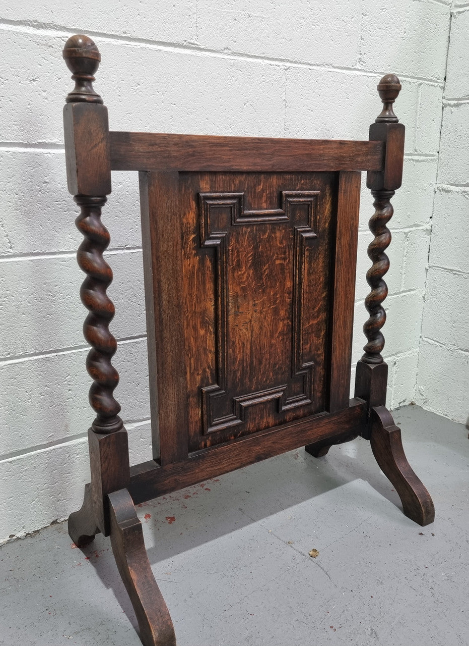 Antique English Oak Jacobean Style fire screen. In good original condition.