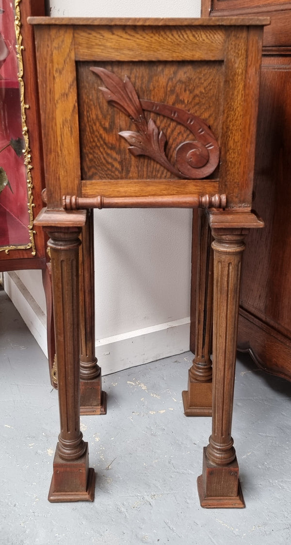 Wooden Arts and Crafts pedestal planter stand with decorative carvings. Sourced locally and is in good original condition.