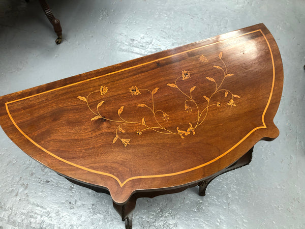 Stunning small inlaid French Walnut Louis XV style hall table with ormolu mounts and beautiful details. It has been sourced from France and is in good orignal detailed condition.