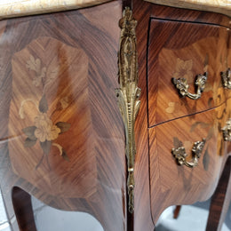 Pair of French bombe shaped commode style marquetry inlaid Kingwood bedside cabinets with marble tops and gilt brass mounts. Circa 1930 in good original detailed condition.