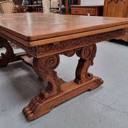 Amazing French Oak Renaissance style parquetry top extension table. Beautiful parquetry top and amazing detailed carvings on the legs. It extends to 306 cm long when fully extended. Sourced from France and in good original detailed condition.