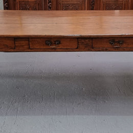 Amazing 19th Century French Oak Farmhouse style dining table with three drawers. It is made from three large planks of wood which is very hard to find. It is also very wide with a width of 105.5 cm. It is in good original detailed condition.