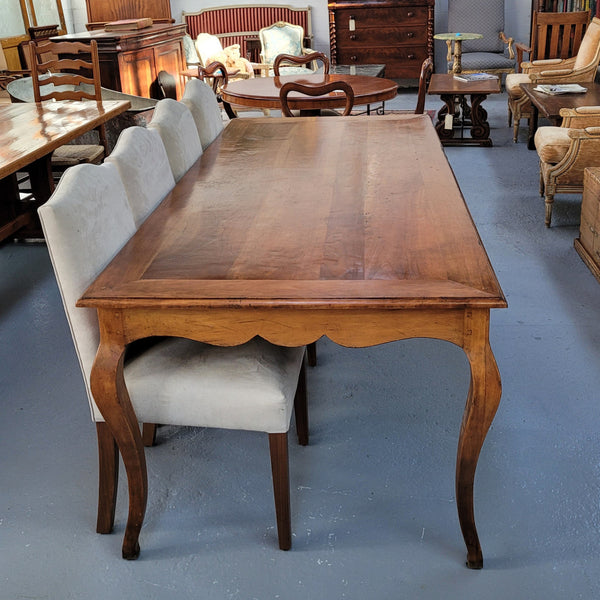 An amazing Vintage Cherry Wood dining table. Comfortably seats eight people and is in good original detailed condition.