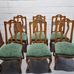 Set of six French style Oak decorative upholstered seat dining chairs. They are comfortable to sit in and are in good original condition, please view photos of fabric as the fabric is in good used condition.