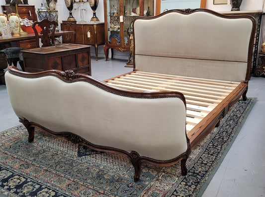 French Louis XV style queen size upholstered bed. Upholstery is in good condition and bed is complete with custom made slats. Just place your mattress on top.